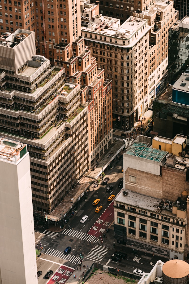 An aerial view of a city with tall buildings