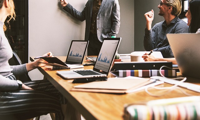 Modern office workspace with technology representing AI content creation tools for small businesses