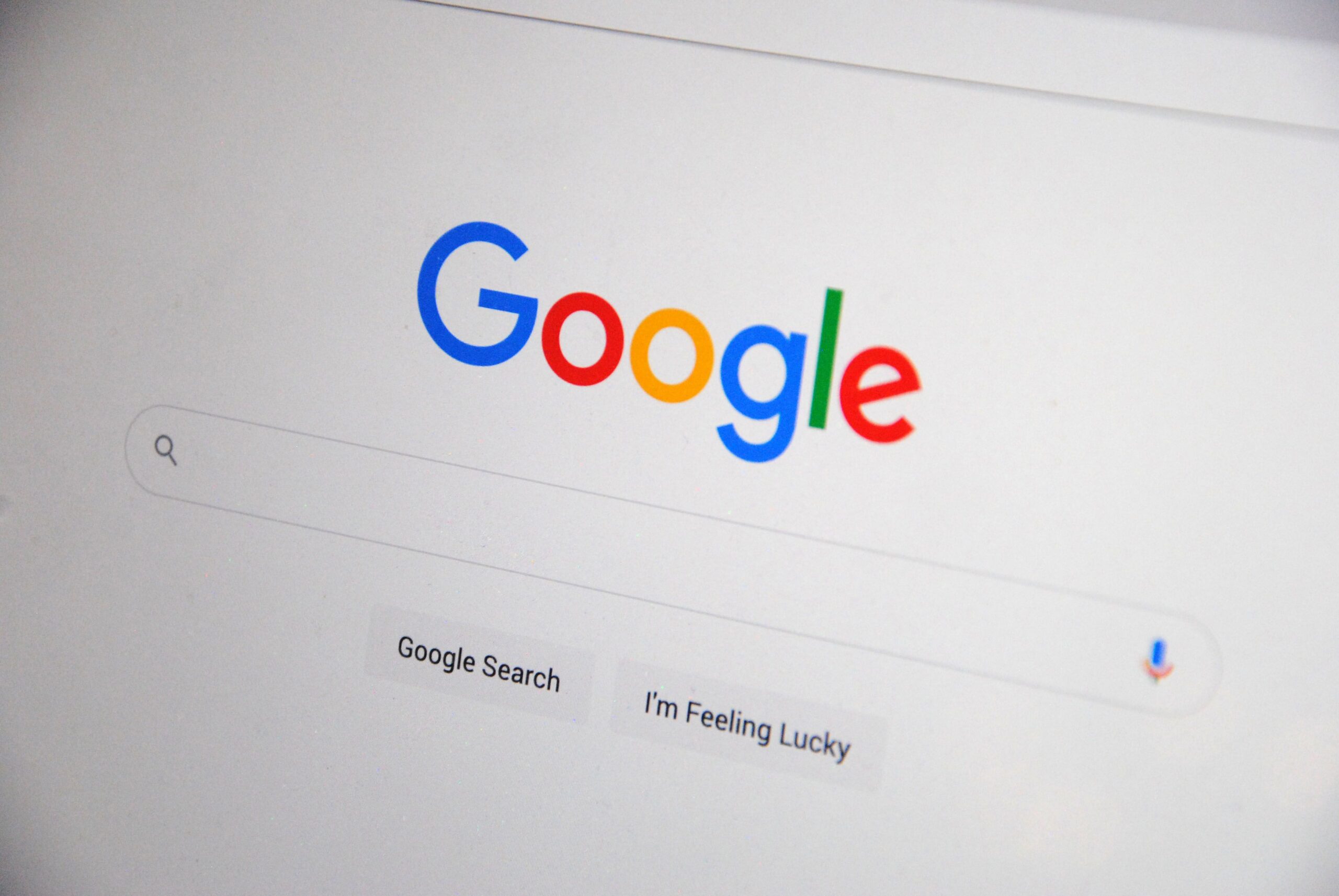 Close-up of the Google search homepage on a screen