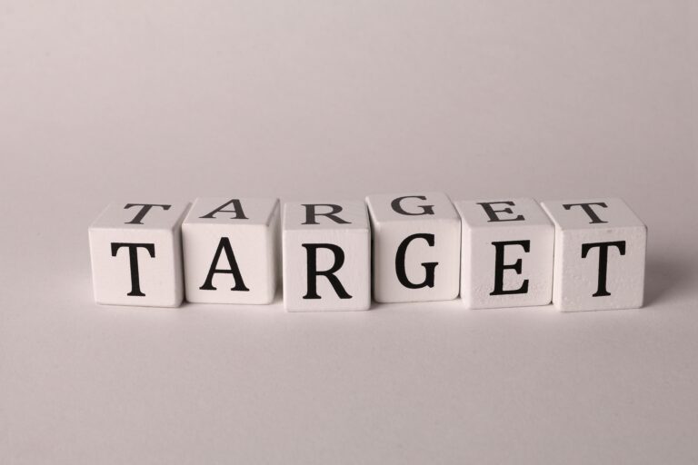 White cubes spelling TARGET representing marketing strategy and sales funnel targeting
