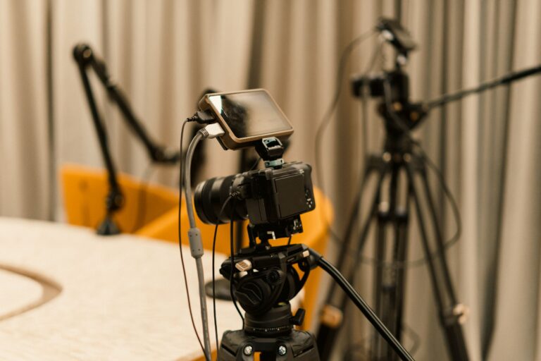 Professional video studio with cameras, microphones and lighting equipment ready for recording