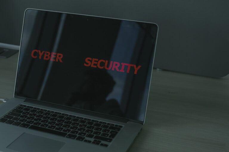 WordPress security checklist - laptop displaying cybersecurity dashboard