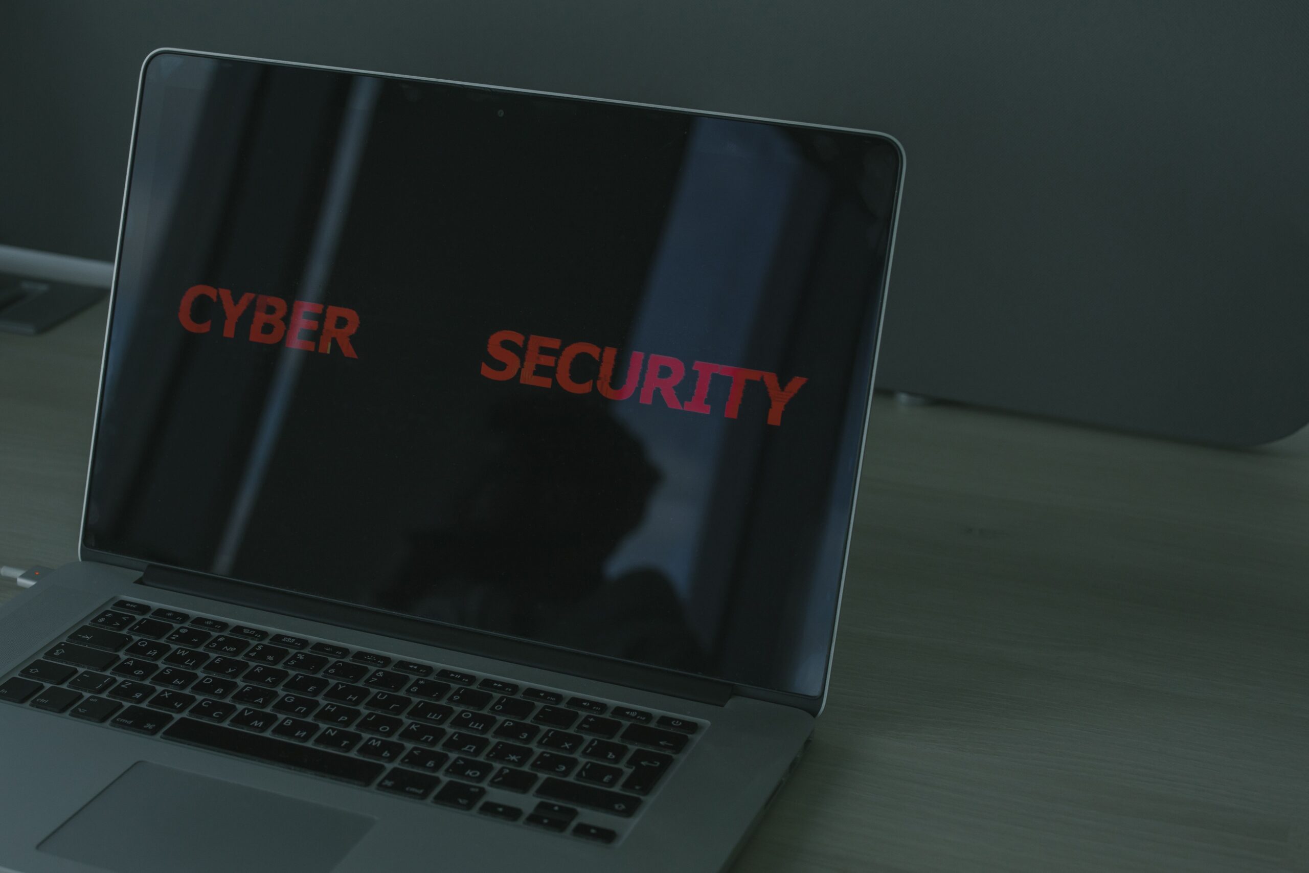WordPress security checklist - laptop displaying cybersecurity dashboard