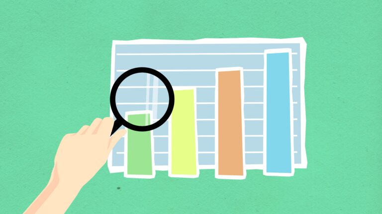SEO audit for small business: a magnifying glass over an analytics chart showing where a website is losing rankings
