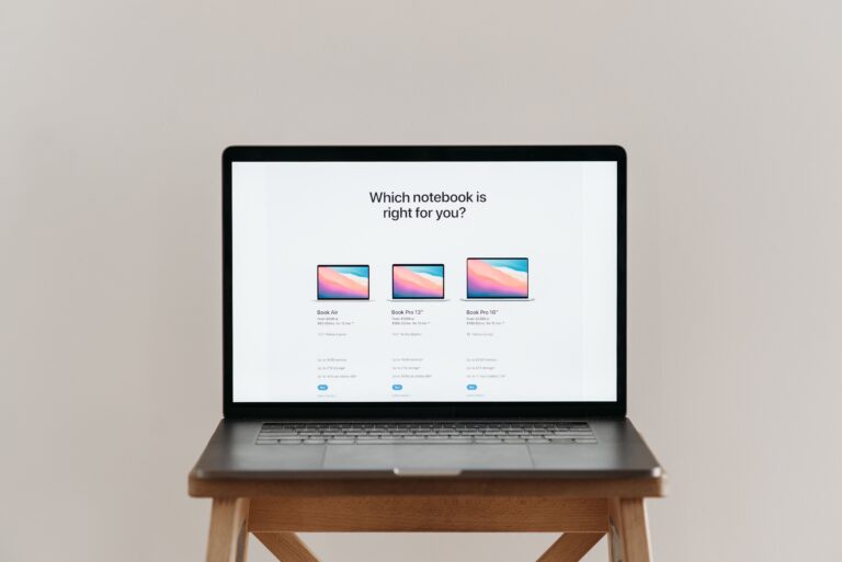 WordPress vs Squarespace vs Shopify - laptop with comparison chart