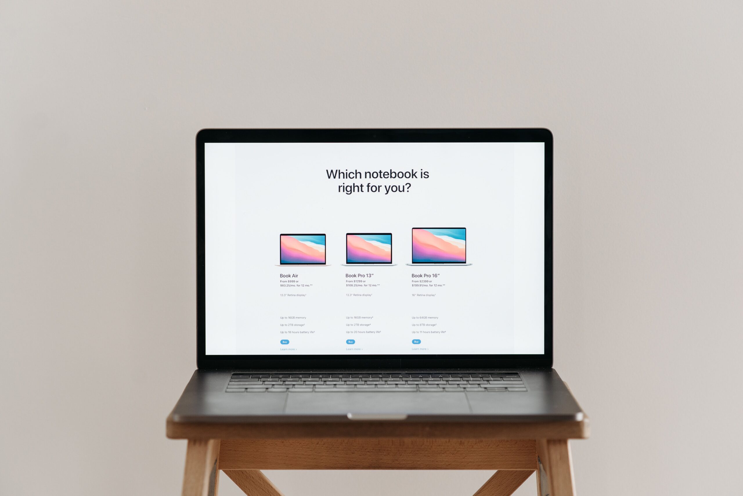 WordPress vs Squarespace vs Shopify - laptop with comparison chart